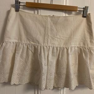 White eyelet lace mini skirt
